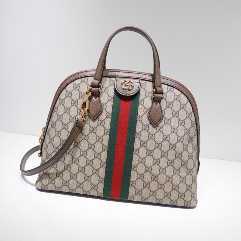 G*u*i top handle bags